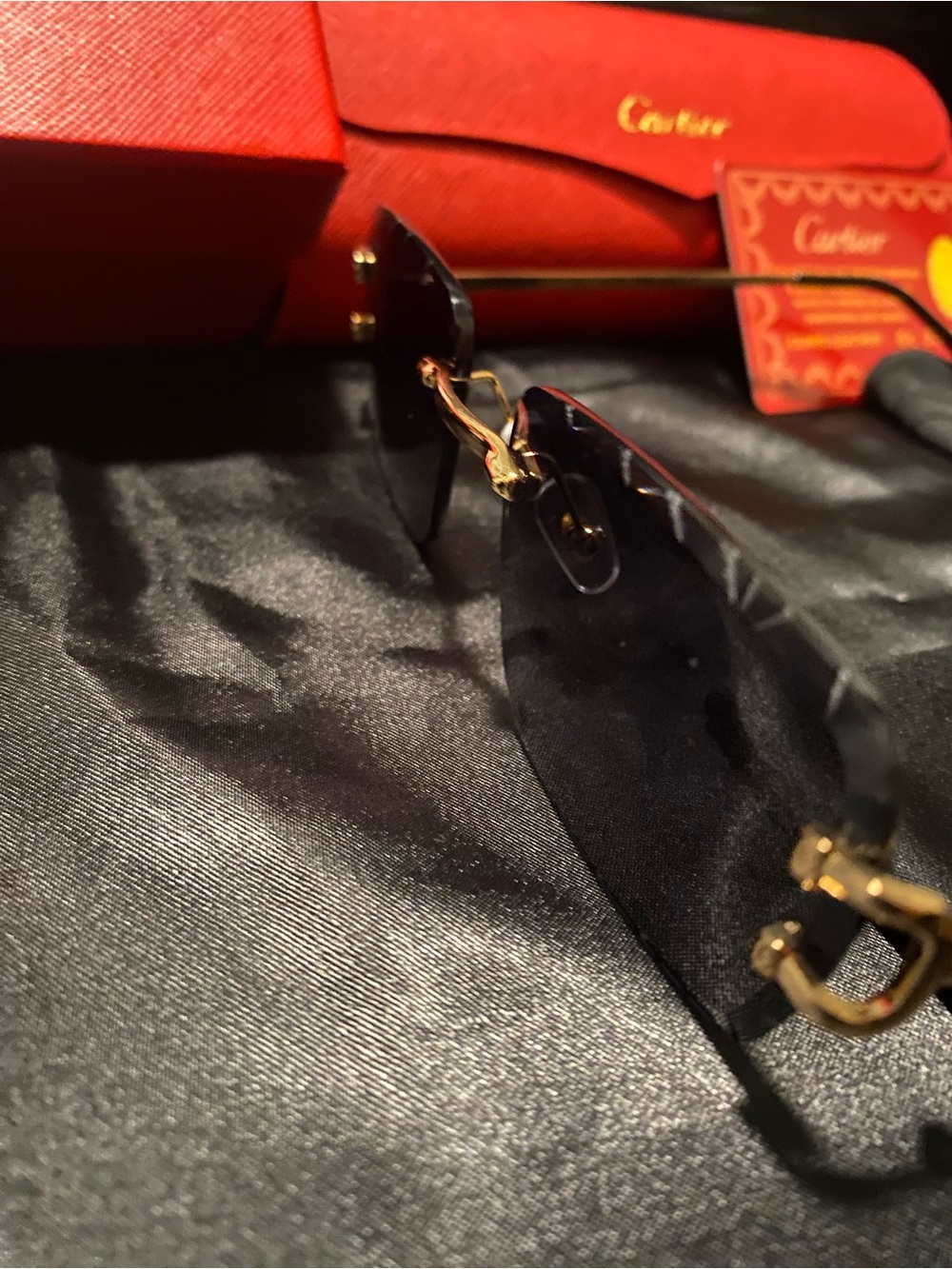 Cartier Black Rimless Sunglasses with Gold Accents